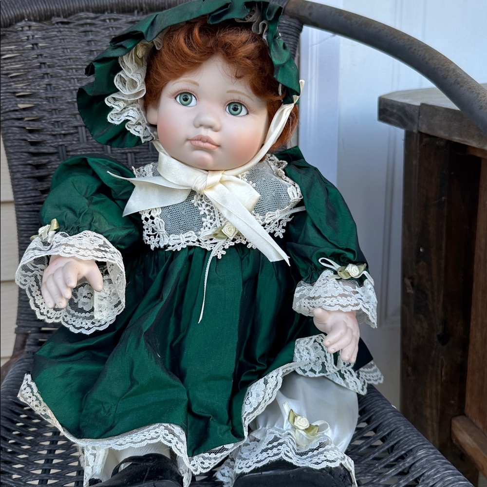 Green and White Porcelain Doll with Lace Details
